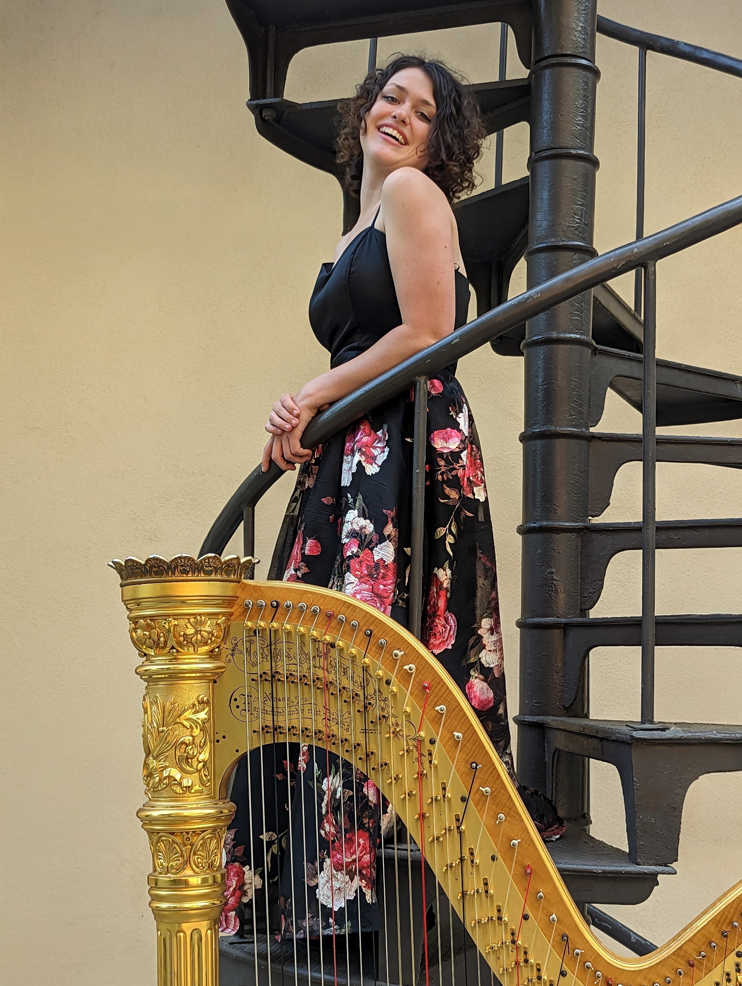 Kaitlin Miller performing on harp